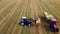 Work in the field for hay harvesting with special equipment.