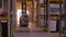 Work forklifts in the warehouse. Forklift with boxes rides between the rows in the warehouse. Industrial interior