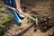 Work in a garden - Digging Spring Soil With Spading fork