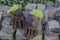 Work gloves lying on a huddle of cobblestones