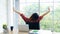 Work from home, Stretch for relax, Young asian woman stretching body while working with laptop computer at her desk home office,