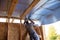 Work insulates the ceiling in the room