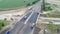 Work on laying of asphalt. Aerial photography video. The repair of the road. The view from the top