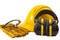 Work safety and safety industrial equipment concept protective ear muffs, safety goggles, suede gloves and yellow helmet or hard