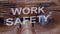 Work safety text on background of female developer