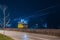 Work train for catenary maintenance at night. Workers working at night to allow the railway line to be opened in the morning