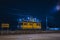 Work train for catenary maintenance at night. Workers working at night to allow the railway line to be opened in the morning