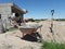 Work zone, wheelbarrow, shovel, sand mountain, mixer and construction site