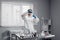 Workbench of a research laboratory where a scientist puts a drop of reagent pipetting into a test tube