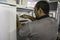 Worker on the assembly line of refrigerated chambers