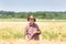 Worker in barley field