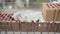 Worker builds a wall of colored brick. Worker in Close up of industrial bricklayer installing bricks and mortar cement brick on