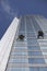 Worker cleaning windows on height