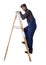 Worker climbing step ladder