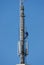 worker climbs on a mobile phone mast