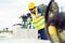 Worker closes the valve on the oil pipeline