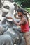 Worker colouring Ganesh idol in hyderabad, India