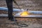 A worker cut steel beams using propane-oxygen torch..Oxy-fuel cutting