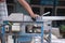 Worker cutting aluminium with grinder blade