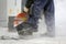 Worker cutting the brick pavers