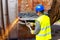 Worker is cutting old metal industrial equipment with acetylene torch