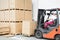 Worker driver at warehouse forklift