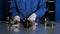 A worker at the factory collects the mechanism of parts and components. Close-up of hands and table. He performs precise movements