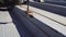 A worker fastens corrugated sheeting