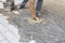 Worker grouting tiles