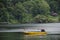 Worker guide local people sailing wooden long tail boat bring thai and foreign travelers trip tour for travel visit at Khun Dan