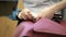 Worker hands in a factory manufacturing leather