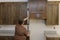 A worker hangs a level at the site for the leveling of new kitchen cabinets and furniture sets that are being installed