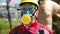 Worker in hard hat, goggles and respirator on electropower station