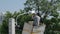 Worker on height lifting platform installing new street light bulb