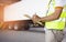 Worker holding clipboard his control loading cargo with shipping container. Cargo freight truck. Shipment.