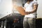 Worker holding clipboard his control loading cargo with shipping container. Cargo freight truck. Warehousing and transportation.