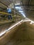 Worker inside a grain storage silo