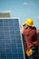 Worker Installing Photovoltaic Panel