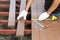 Worker installing wood floor