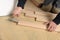 Worker installing wood parquet