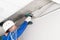 A worker installs a router on the wall to transmit the Internet signal in offices and homes