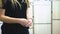 Worker Laundry girl holding fresh towels in her hands. Stock. Woman holding a towel in her hands