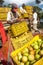 Worker loading tomato on truck