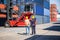 Worker man and Female engineer control loading containers box from cargo, caucasian industrial foreman worker in hard hat