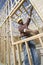 Worker Measuring Window Frame