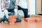 Worker in occupational therapy re-learning to lay bricks