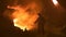 Worker operates in blast furnace workshop