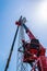 Worker operator of the aerial platform at the workplace. Installation of a wind generator