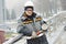 Worker polishing metal fence barrier