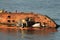 Worker prepare to salvage wrecked ship